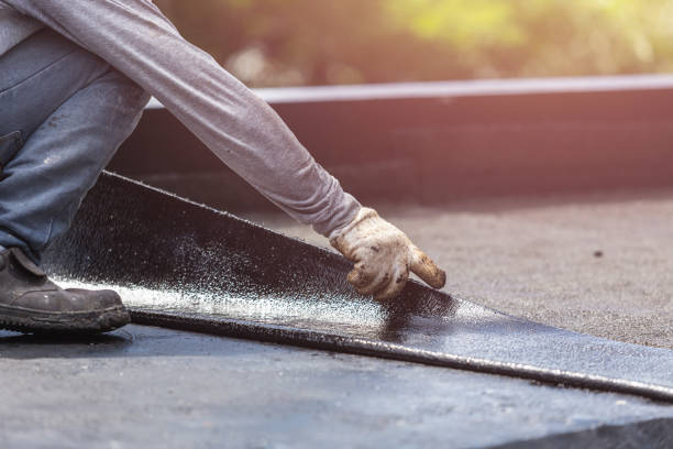 Professional Waterproofing technician working in Haydenville, OH